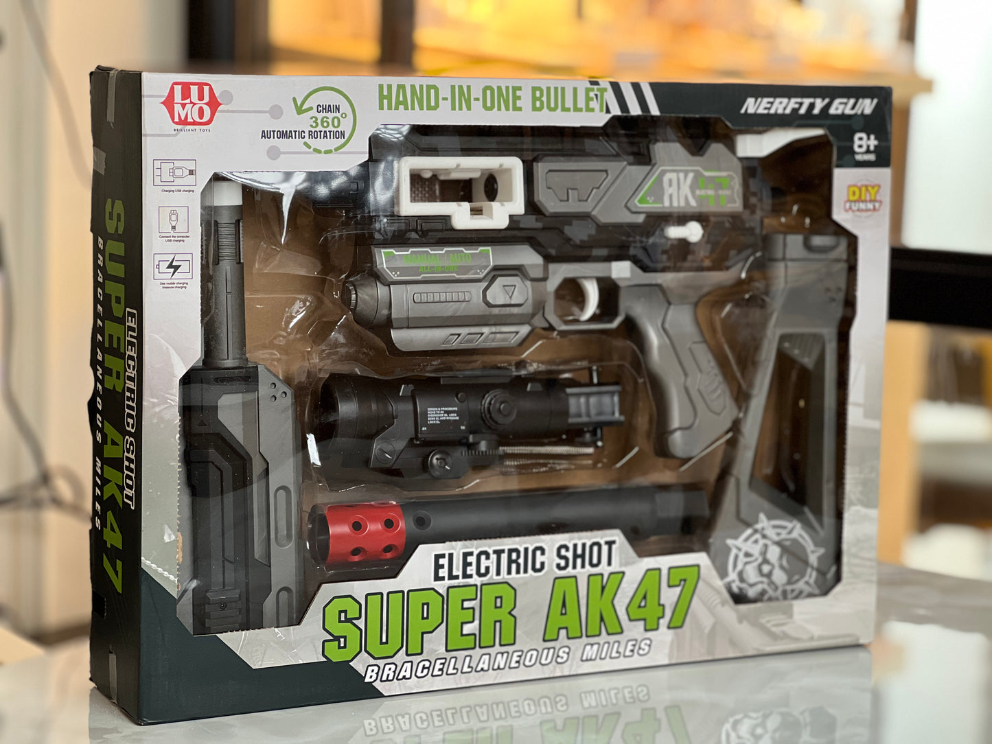 “AK47” styling, the Nerf-style play compatibility, and the target age, making it clear and attractive for shoppers.